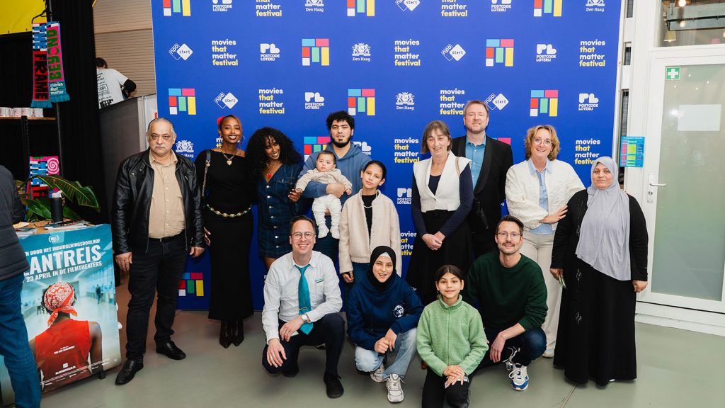 Director Ton van Zantvoort, composer Roy Bemelmans and cast at the 2026 premiere of the Dutch documentary Customer Journey (Klantreis) at Movies That Matter film festival in The Hague.